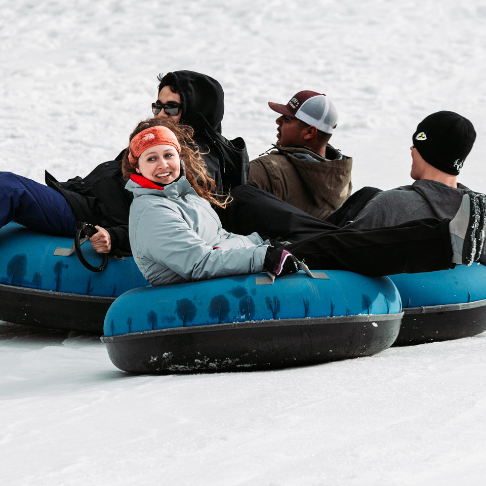 group of guests tubing
